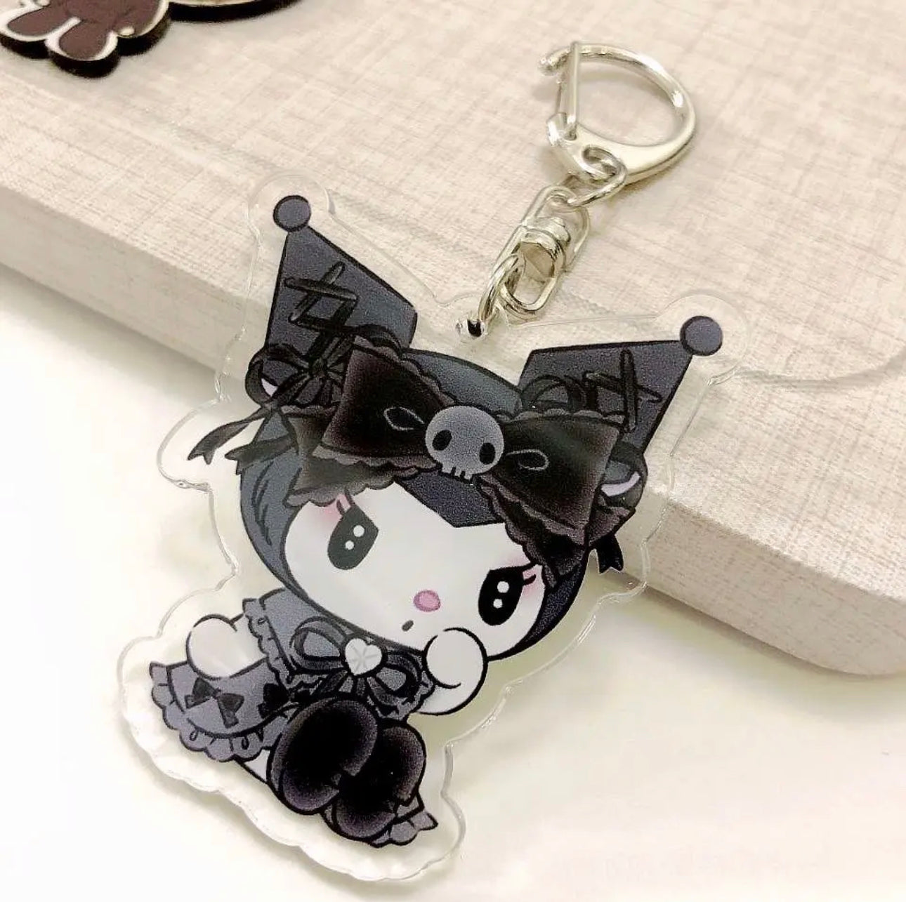 Melody and Kuromi Melokuro acrylic keychains