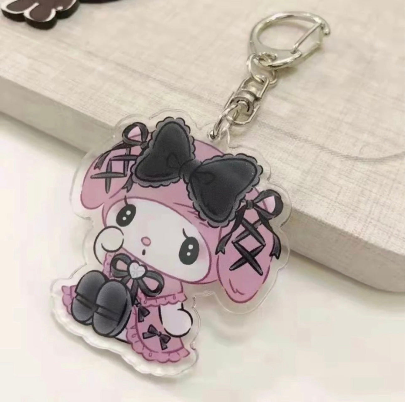 Melody and Kuromi Melokuro acrylic keychains
