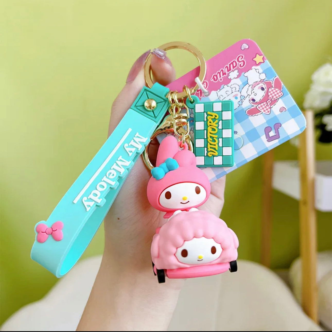 Sanrio Race Car with Rolling Wheels Keychains