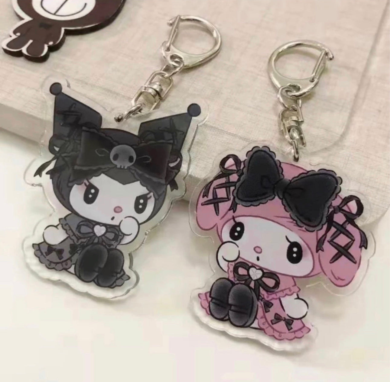 Melody and Kuromi Melokuro acrylic keychains
